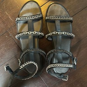 Gently worn Coach flat sandals with metal detail